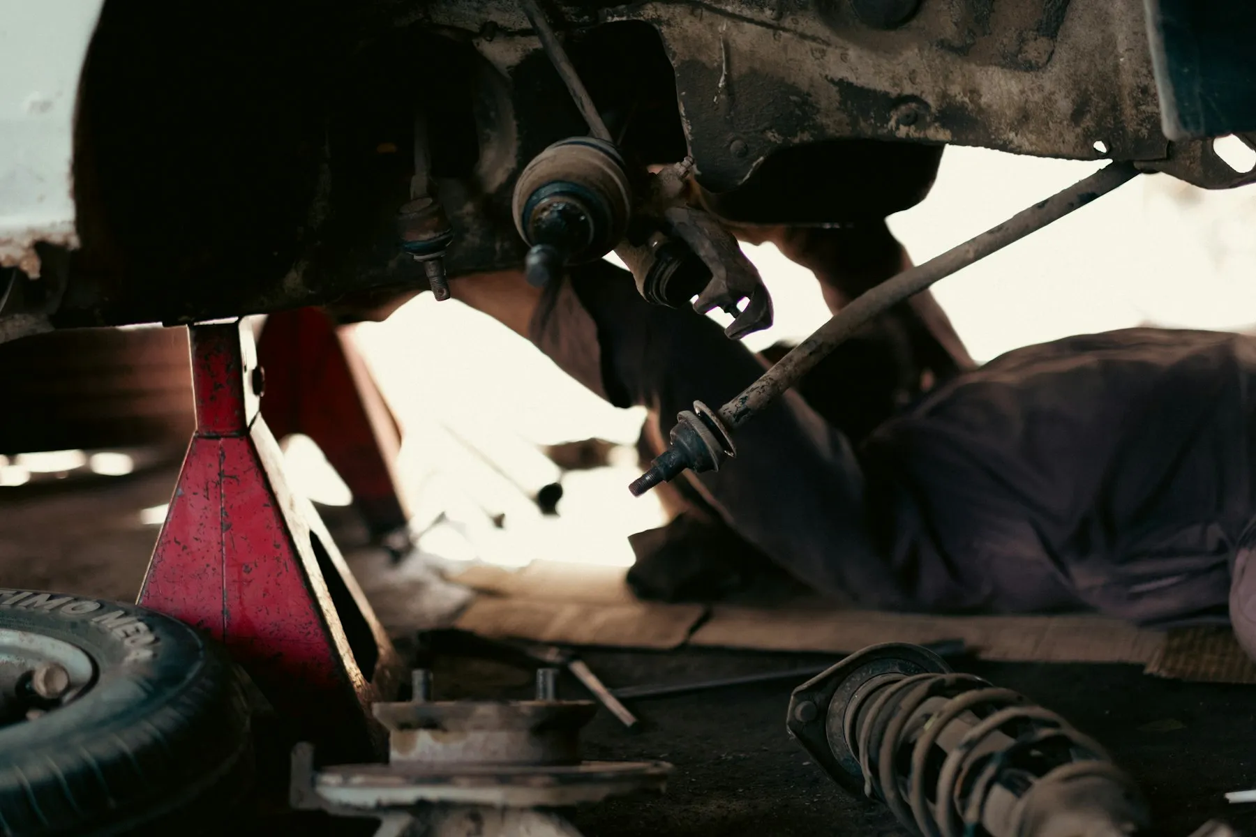 Working underneath a raised car
